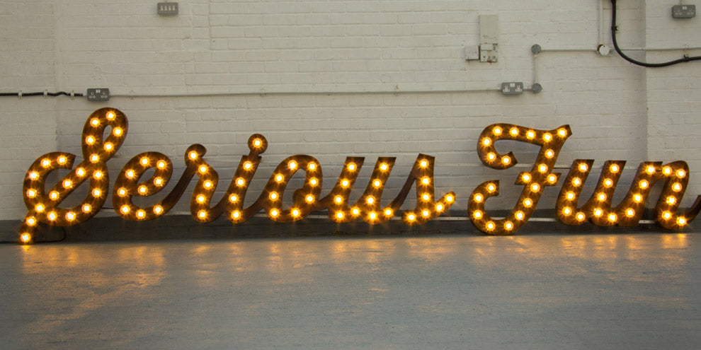 Rusted Script Sign