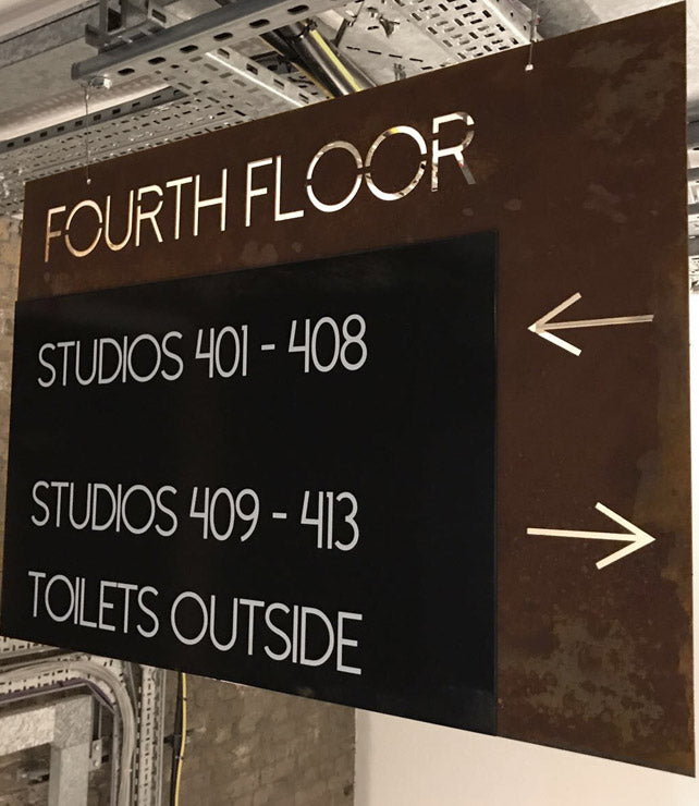Rusted floor sign