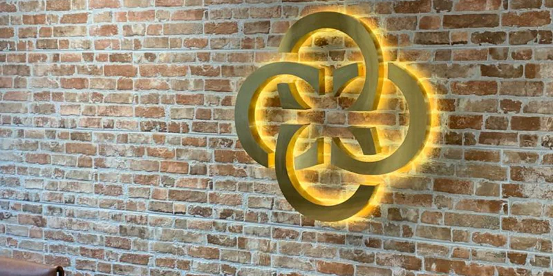 Brushed Brass Illuminated Logo – Brass Signs by Goodwin & Goodwin, London
