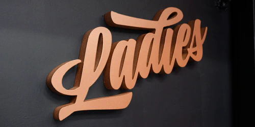 images/copper_typography_toilet_sign.jpg